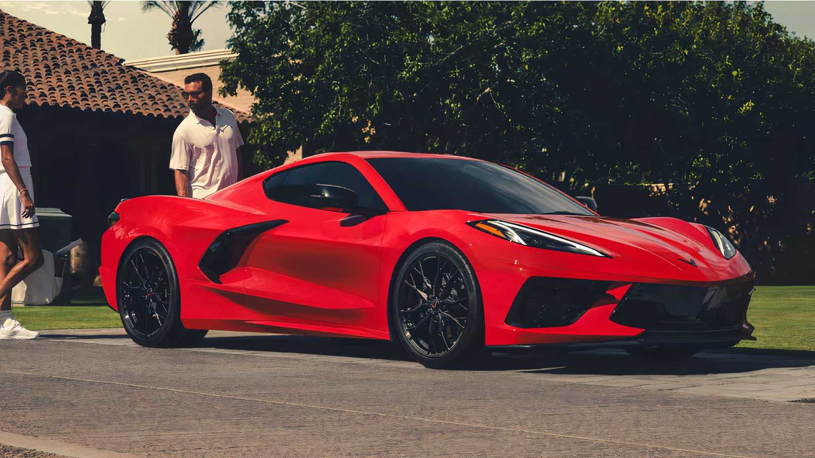2025 Corvette Stingray in red parked outside of tennis club