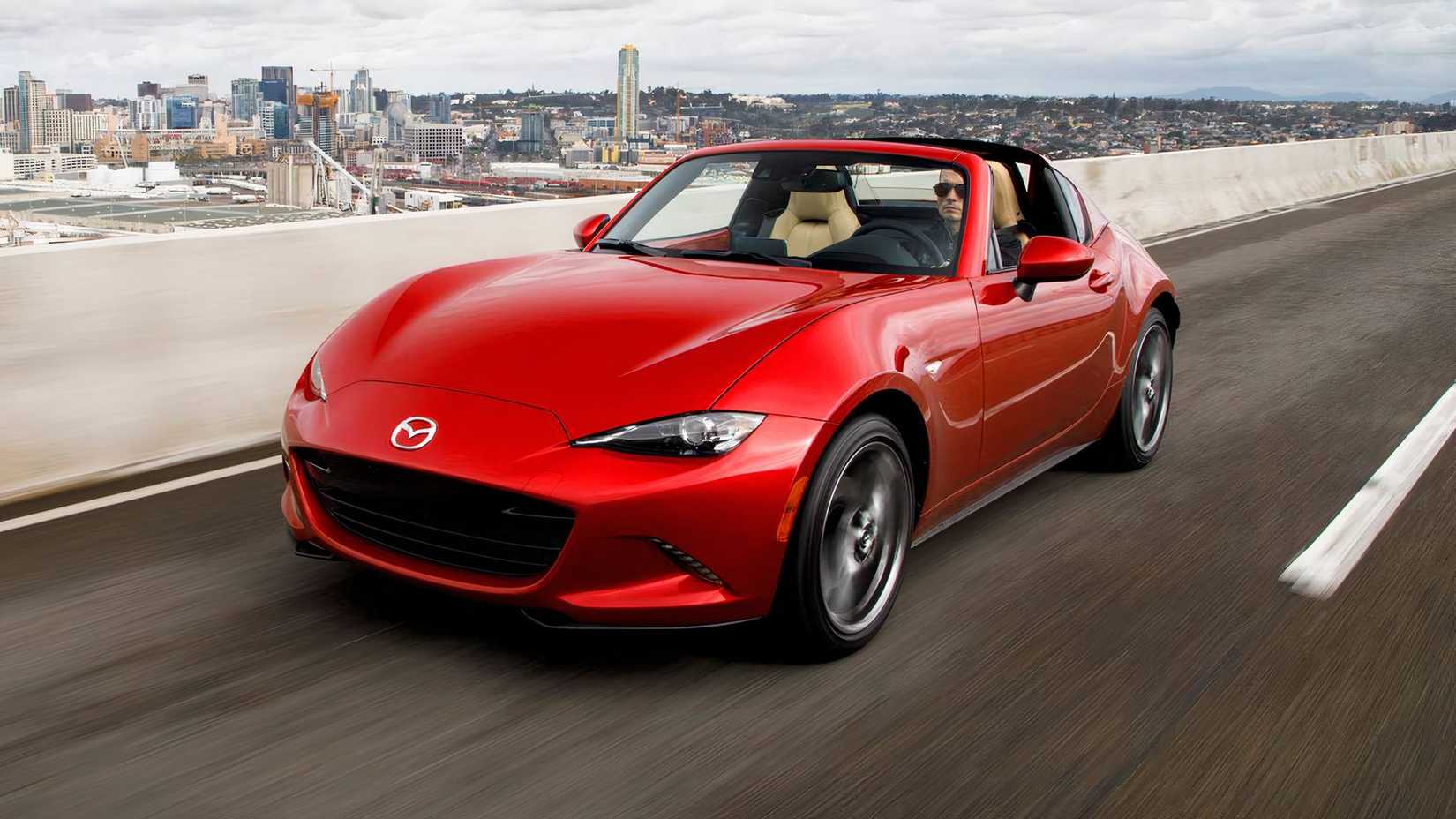 2017 Mazda MX-5 Miata in red driving on highway