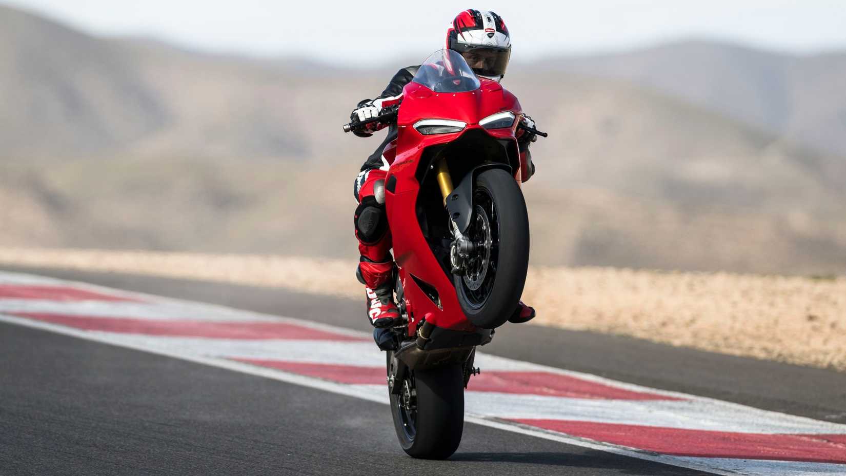 2025 Ducati Panigale V2 S exibindo um papel de parede de bicicleta esportiva HD com cavalinhos