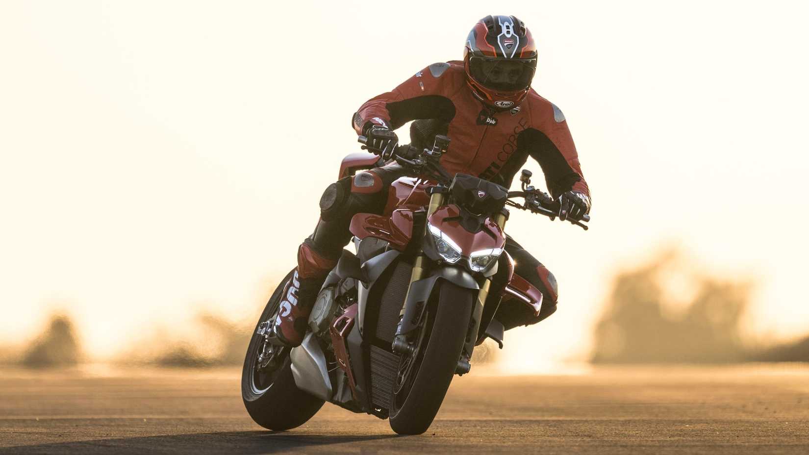 2025 Ducati Streetfighter V4 S sliding on a racetrack hd sports bike wallpaper