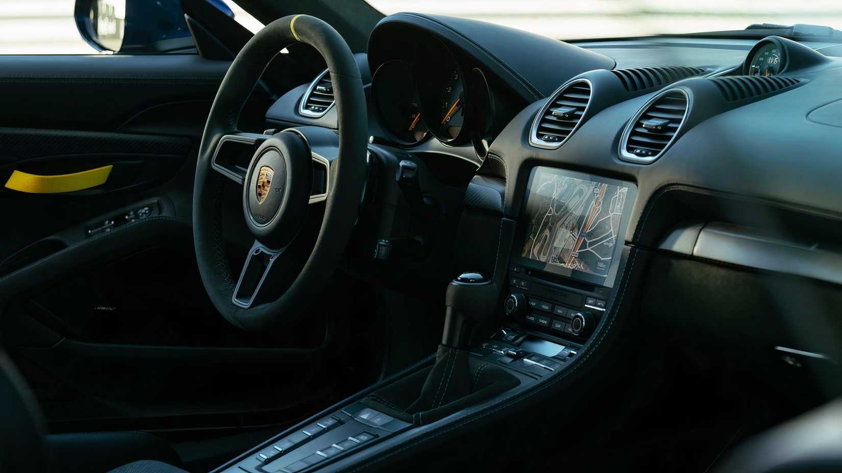 Porsche 718 Cayman GT4 RS interior, view of dash and front of cabin
