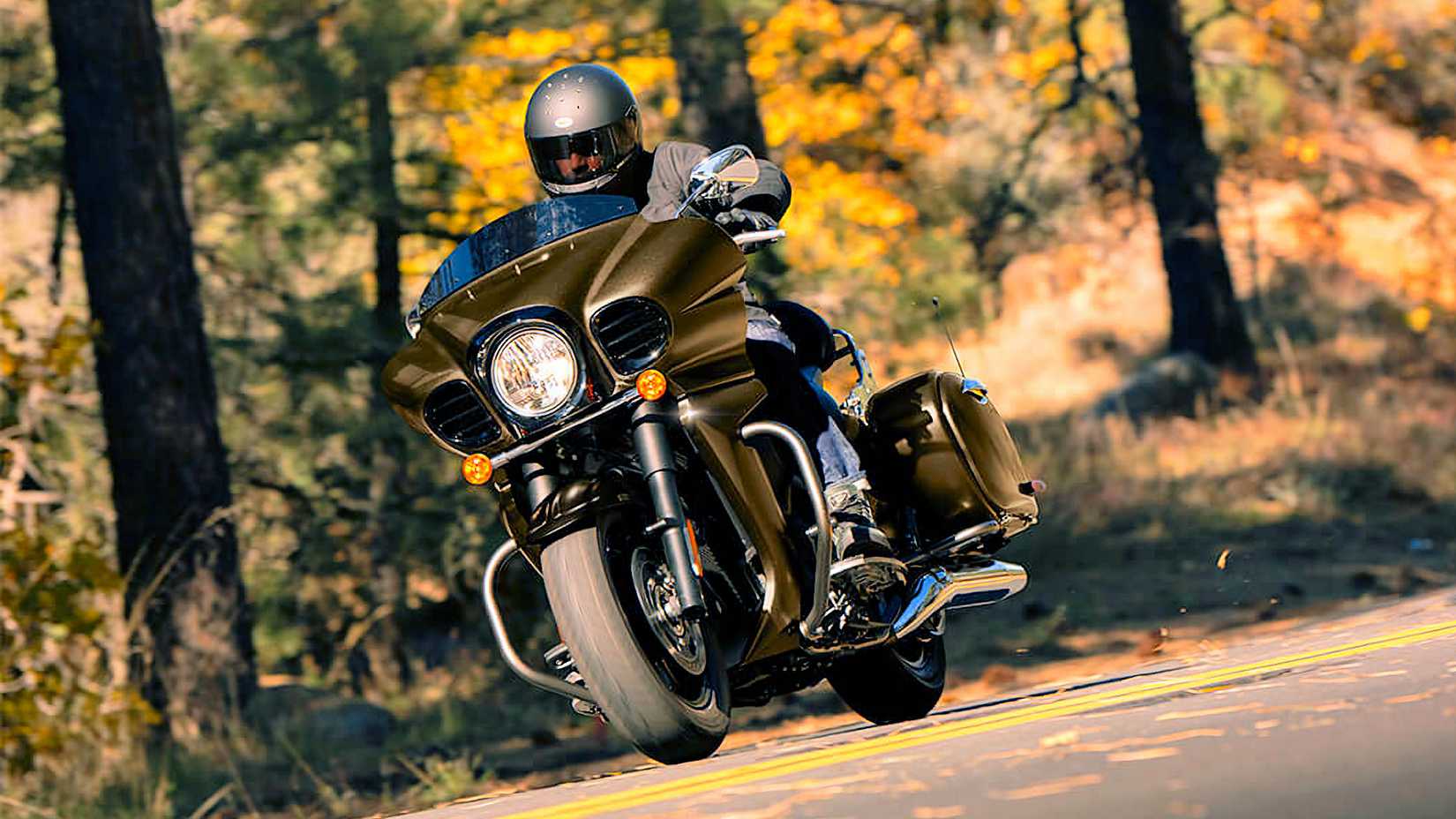 An action shot of a rider on a 2025 Kawasaki Vulcan 1700 Vaquero