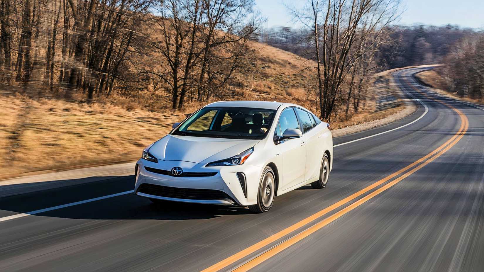 A white 2020 Toyota Prius hatchback. 