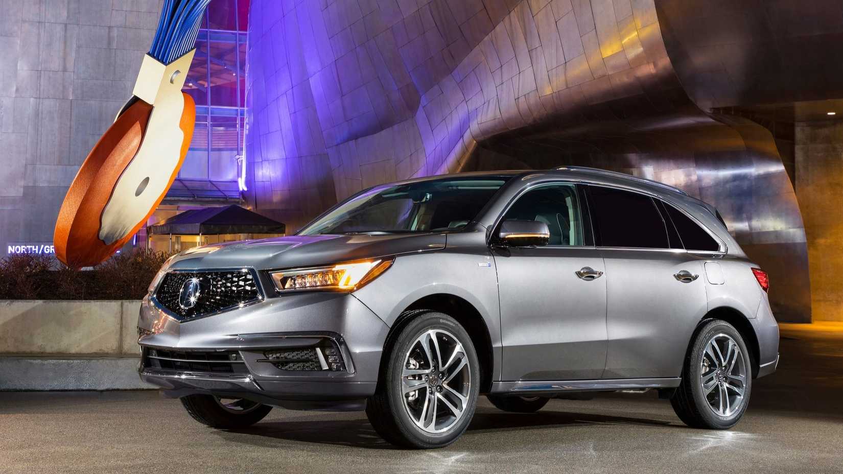 Front 3/4 shot of a 2017 Acura MDX in silver parked