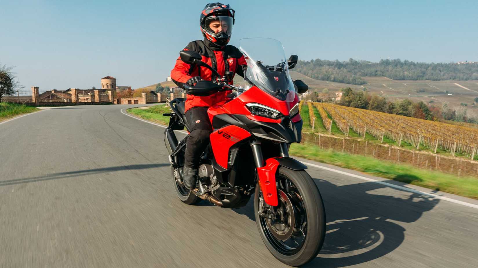 Front shot of a 2025 Ducati Multistrada V2 riding down country road