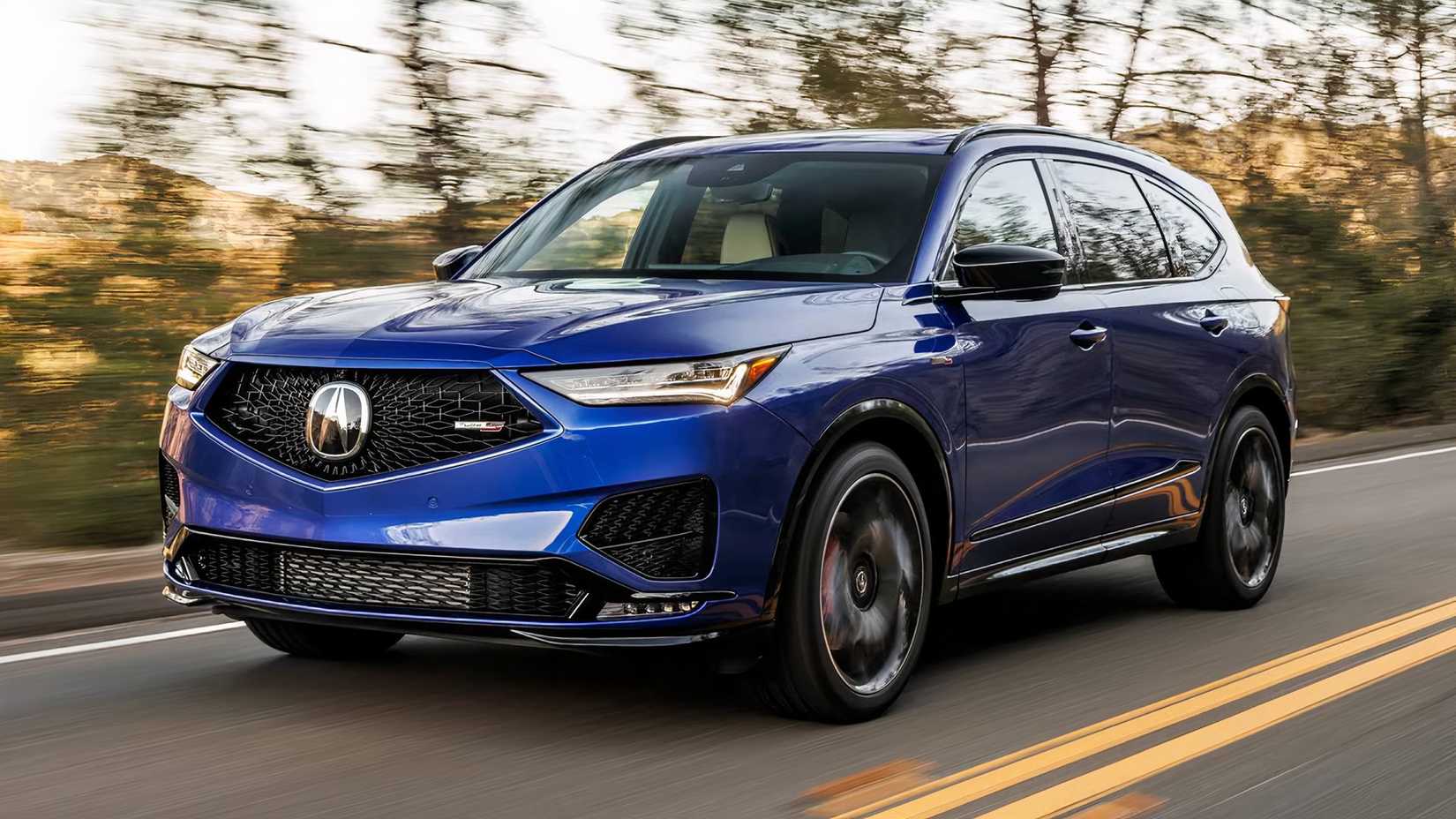 2024 Acura MDX Type S in blue driving on highway