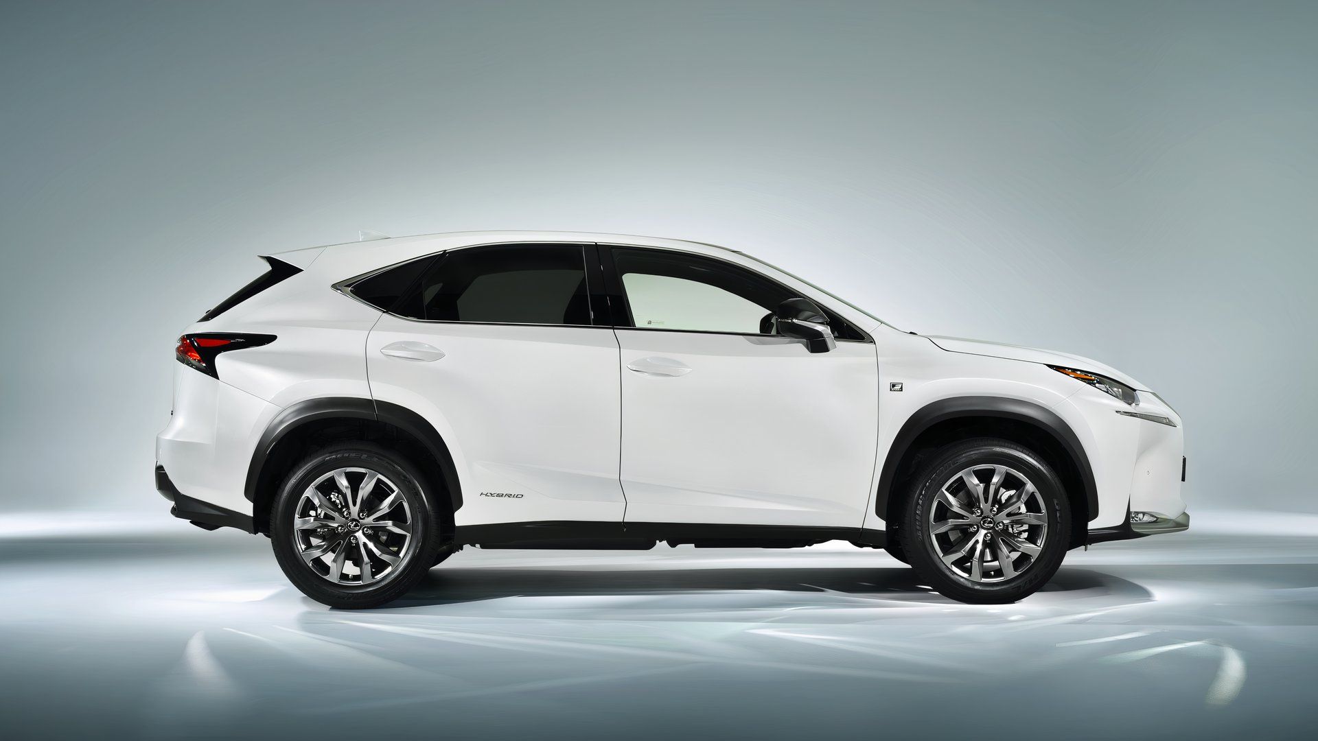 Side profile shot of a white 2015 Lexus NX300h