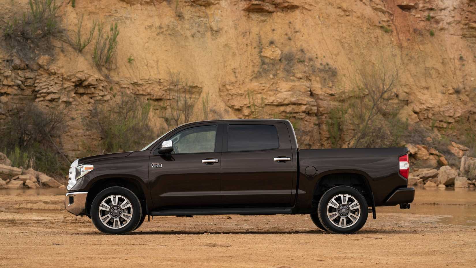 Side profile of a 2019 Toyota Tundra parked off-road