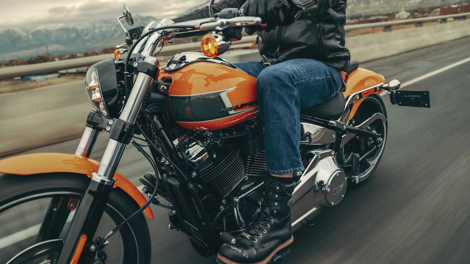 Close-up shot of a 2023 Harley-Davidson Breakout cruising on the highway