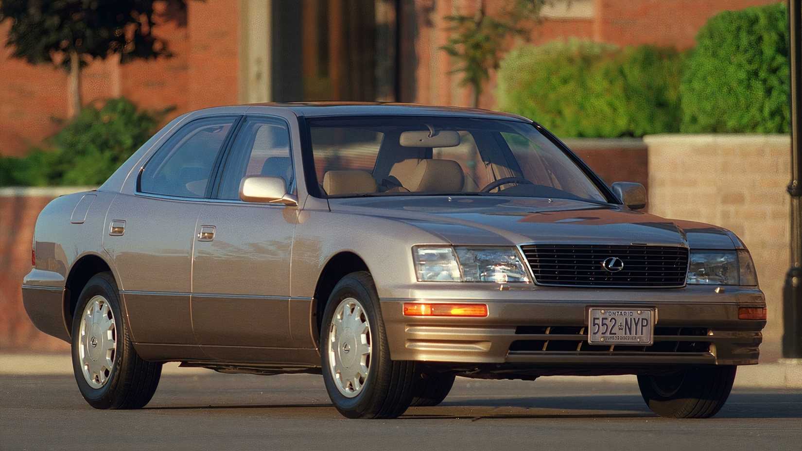 Gold Lexus LS 400, front 3/4 shot parked
