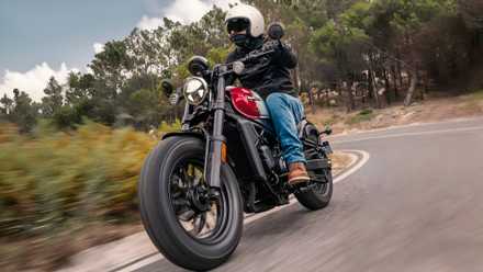 CFMOTO 45CL-C cruiser cornering on the road side profile view