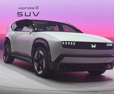 Honda 0 Series SUV electric vehicle prototype on stage at CES 2025 front three-quarters photo