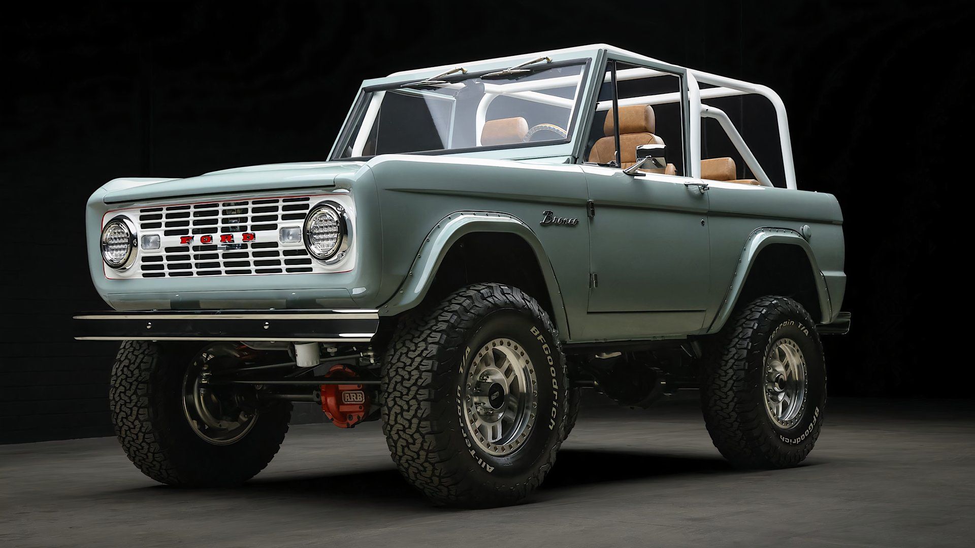 1974 Ford Bronco Raptor in light blue posing in a studio