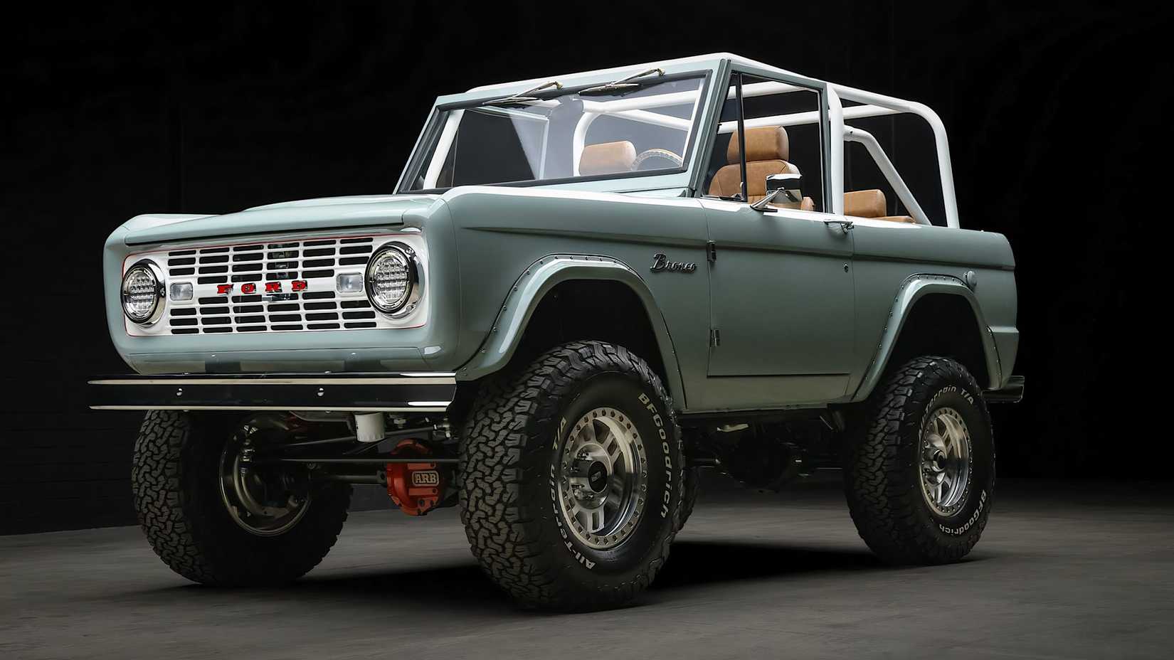 1974 Ford Bronco Raptor in light blue posing in a studio