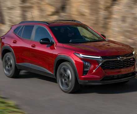 2024 Chevrolet Trax 2RS in red driving on mountain road