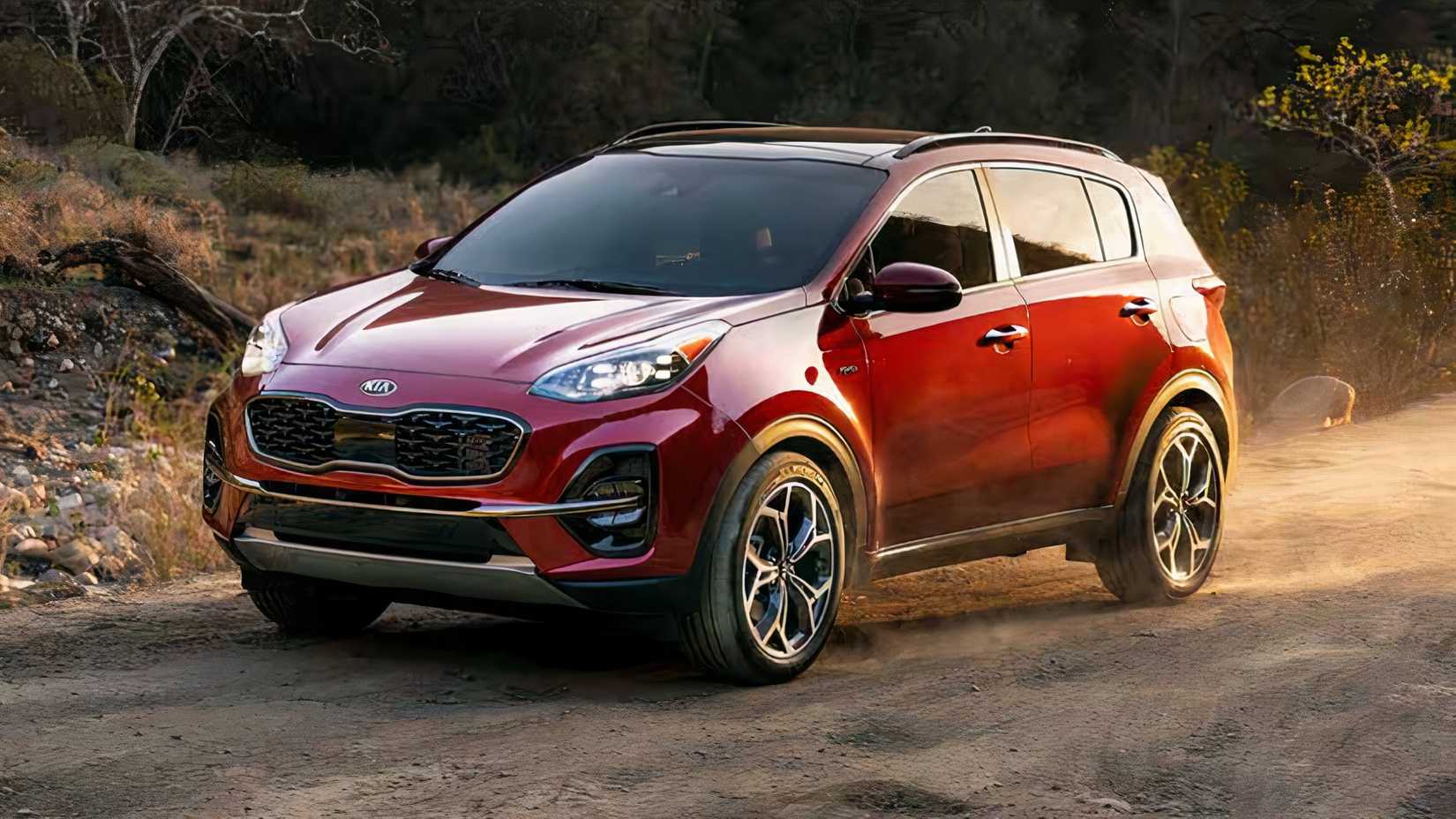 2020 Kia Sportage SX Turbo in red driving on gravel road