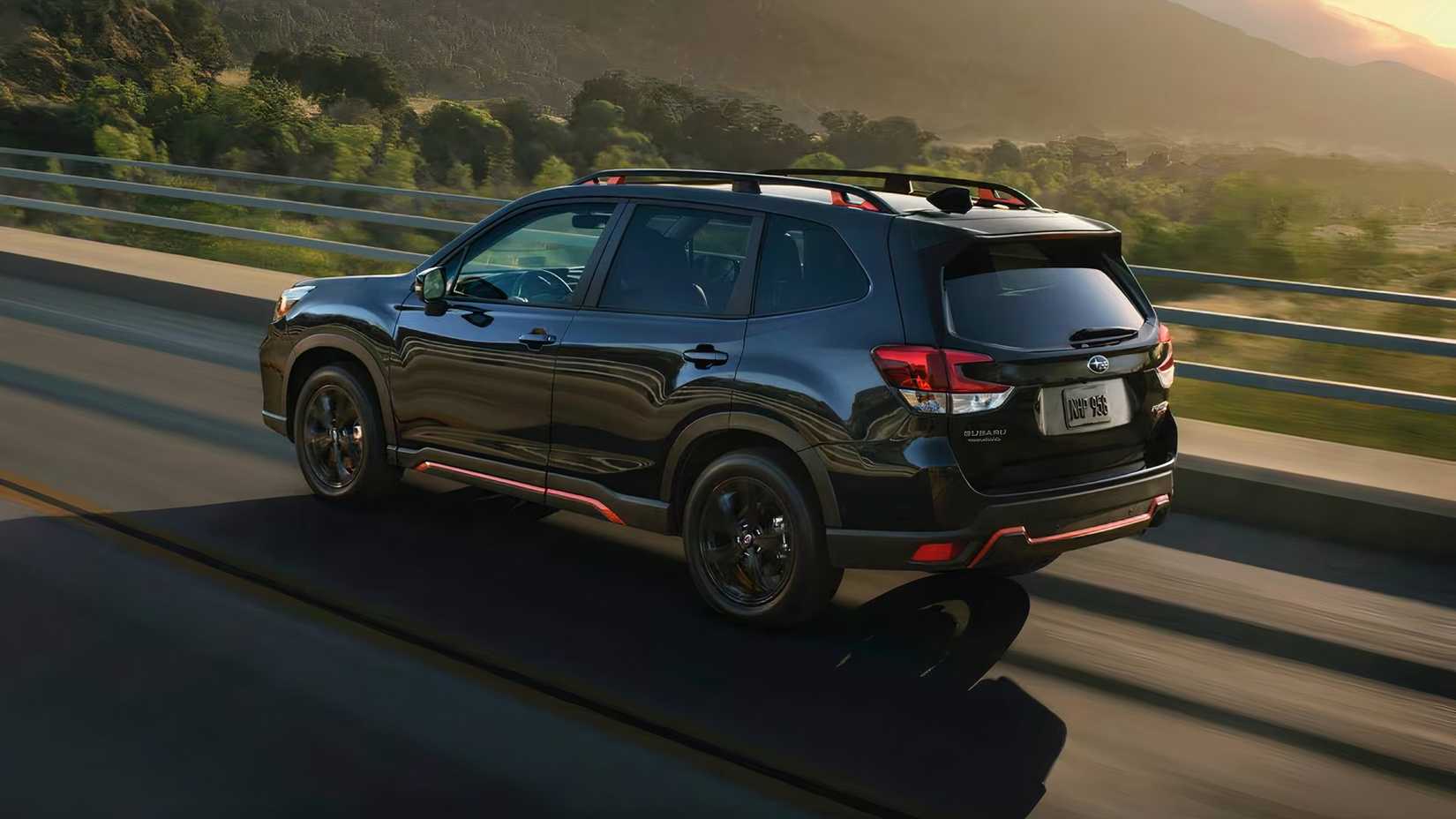 2020 Subaru Forester Lifestyle in black driving over bridge