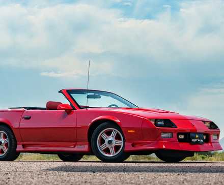 1992 Chevrolet Camaro Z28 in red parked