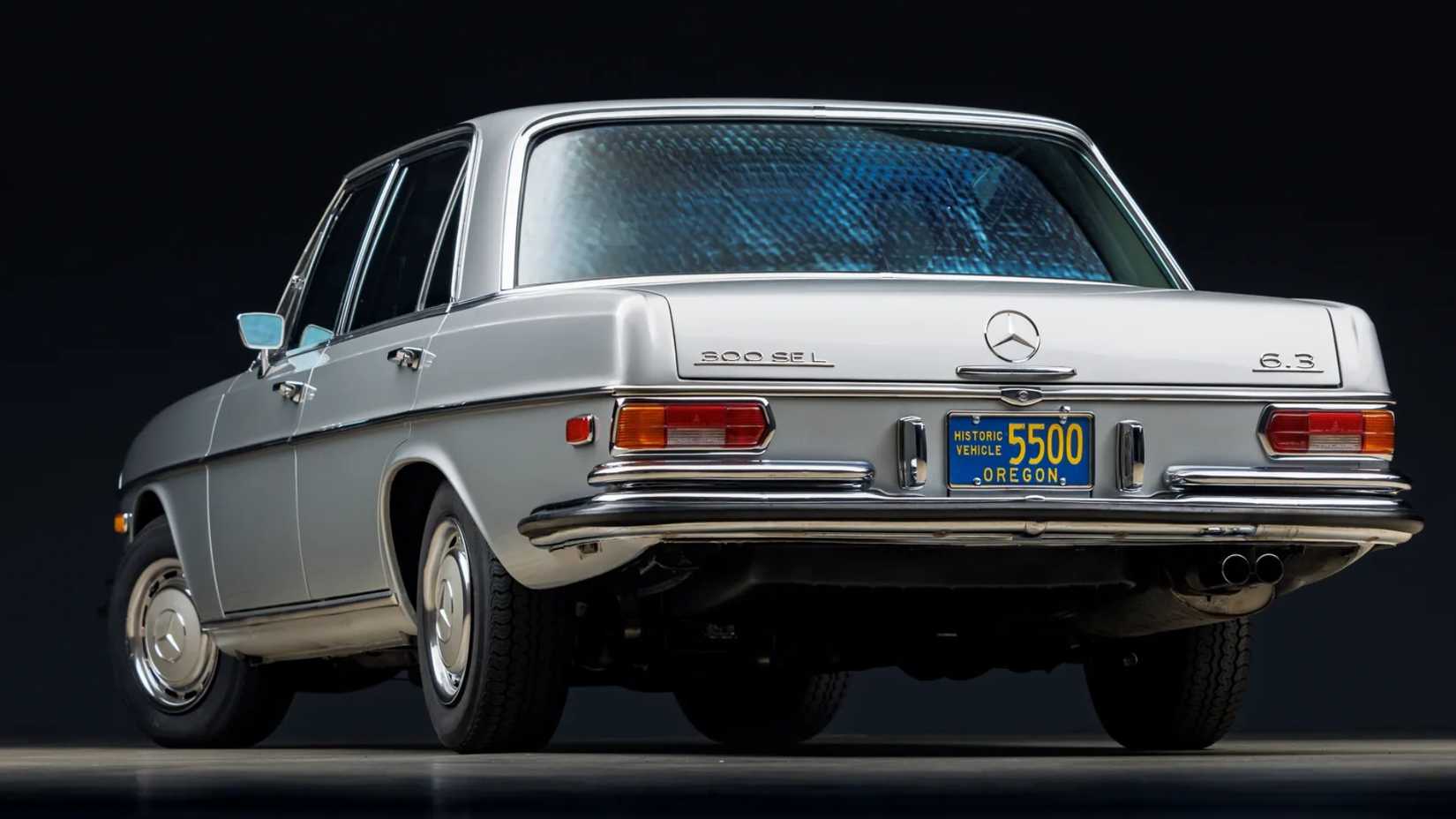 Silver Mercedes-Benz 300SEL 6.3-4