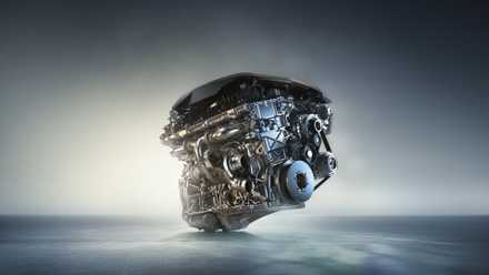 Motor B58 BMW, close do bloco em fundo estilizado