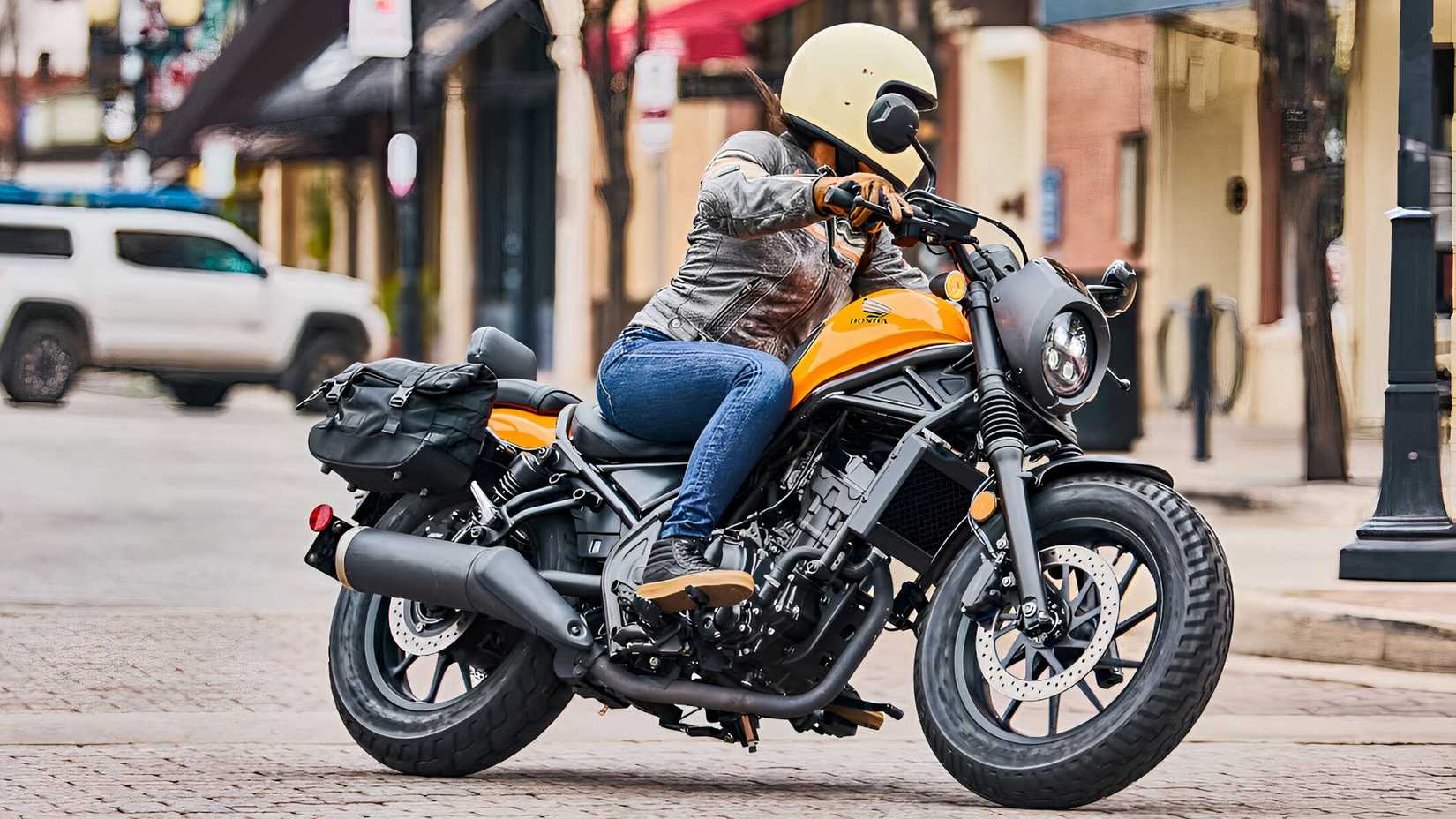 2025 Honda Rebel 300 cornering in the city