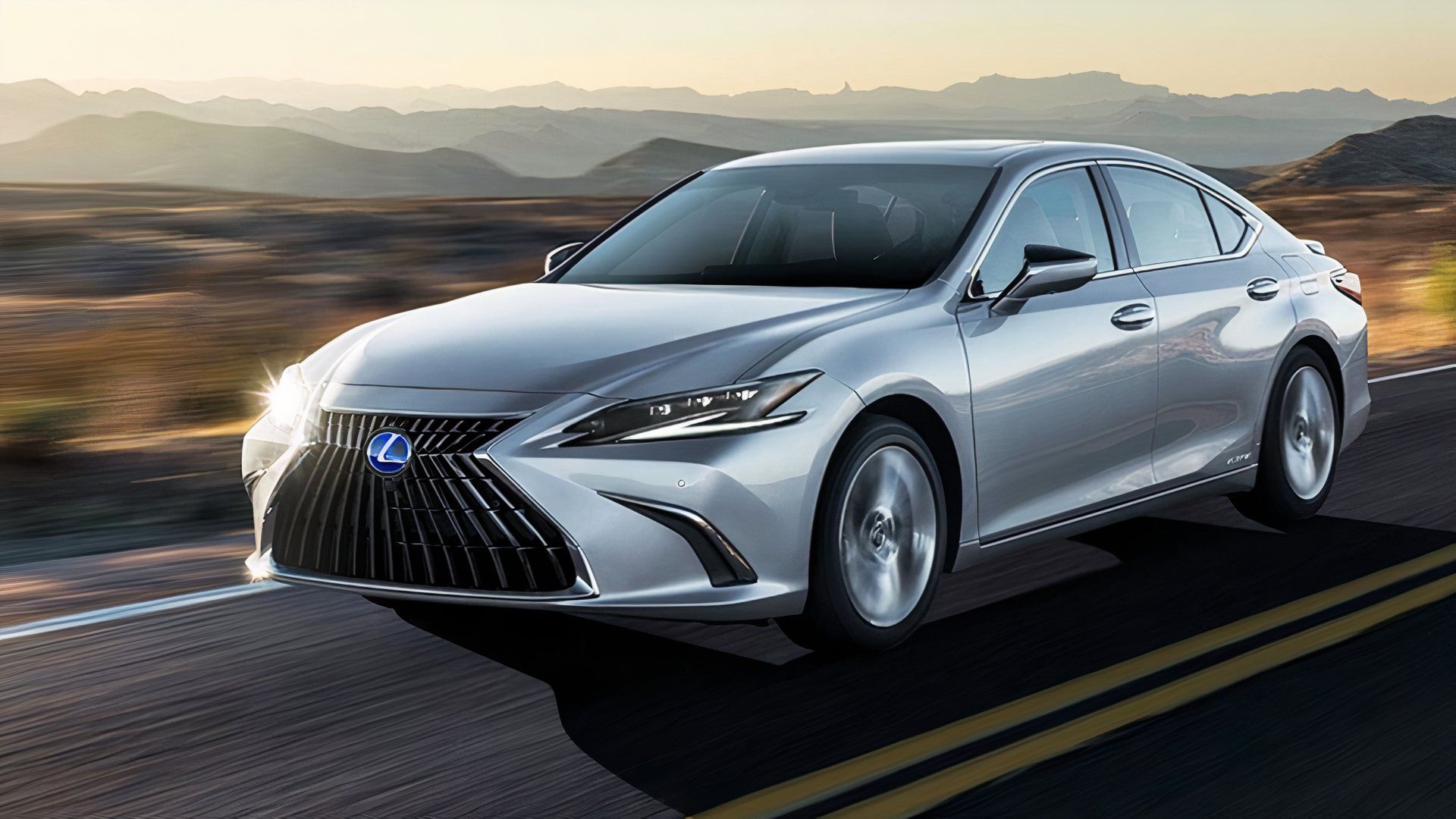 Front 3/4 action shot of a 2025 Lexus ES 300h