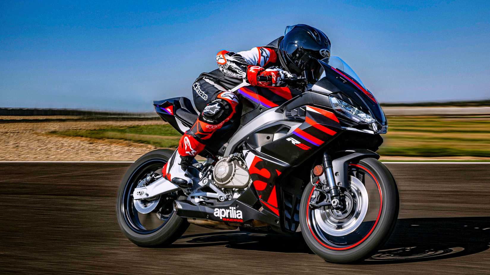 Rider on a 2024 Aprilia RS 457