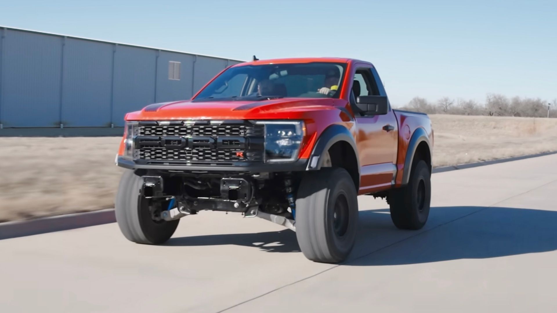 Watch A Custom Ford F-150 Raptor R Two-Door Come Together, Then Go Jumping