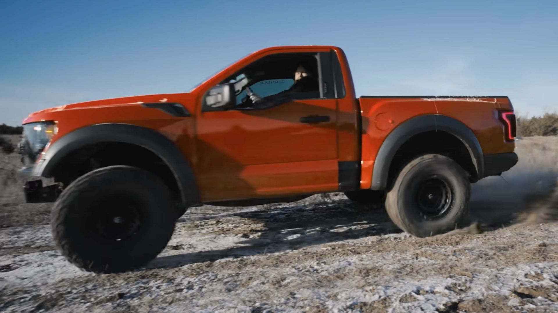 Watch A Custom Ford F-150 Raptor R Two-Door Come Together, Then Go Jumping