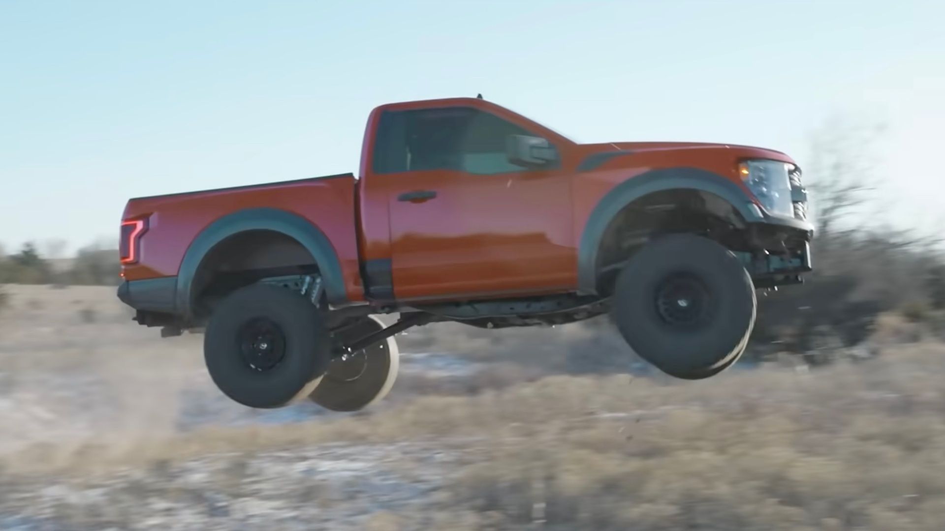 Watch A Custom Ford F-150 Raptor R Two-Door Come Together, Then Go Jumping