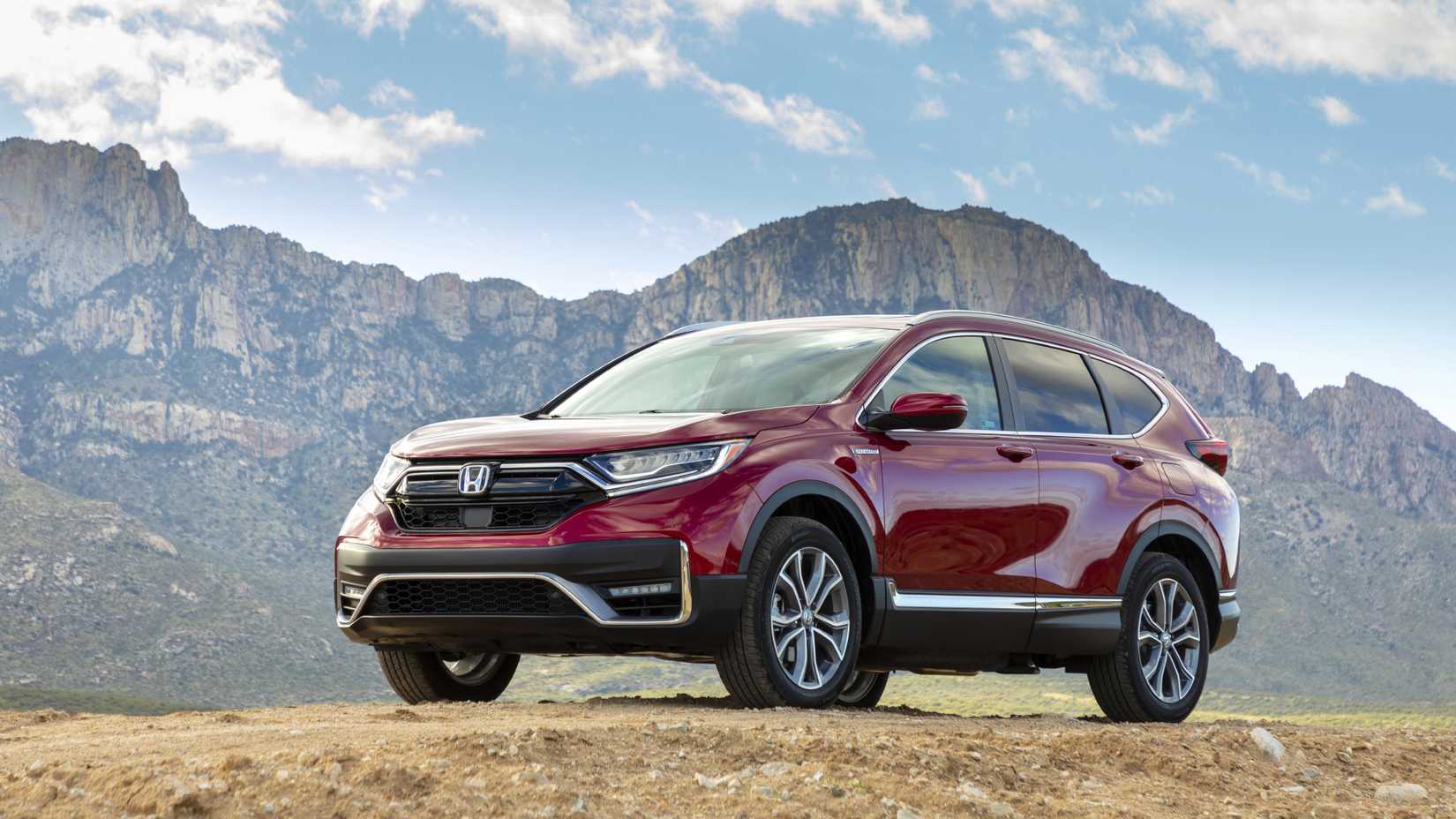 2020 Honda CR-V Hybrid Exterior Parked In Front Of Mountain Range