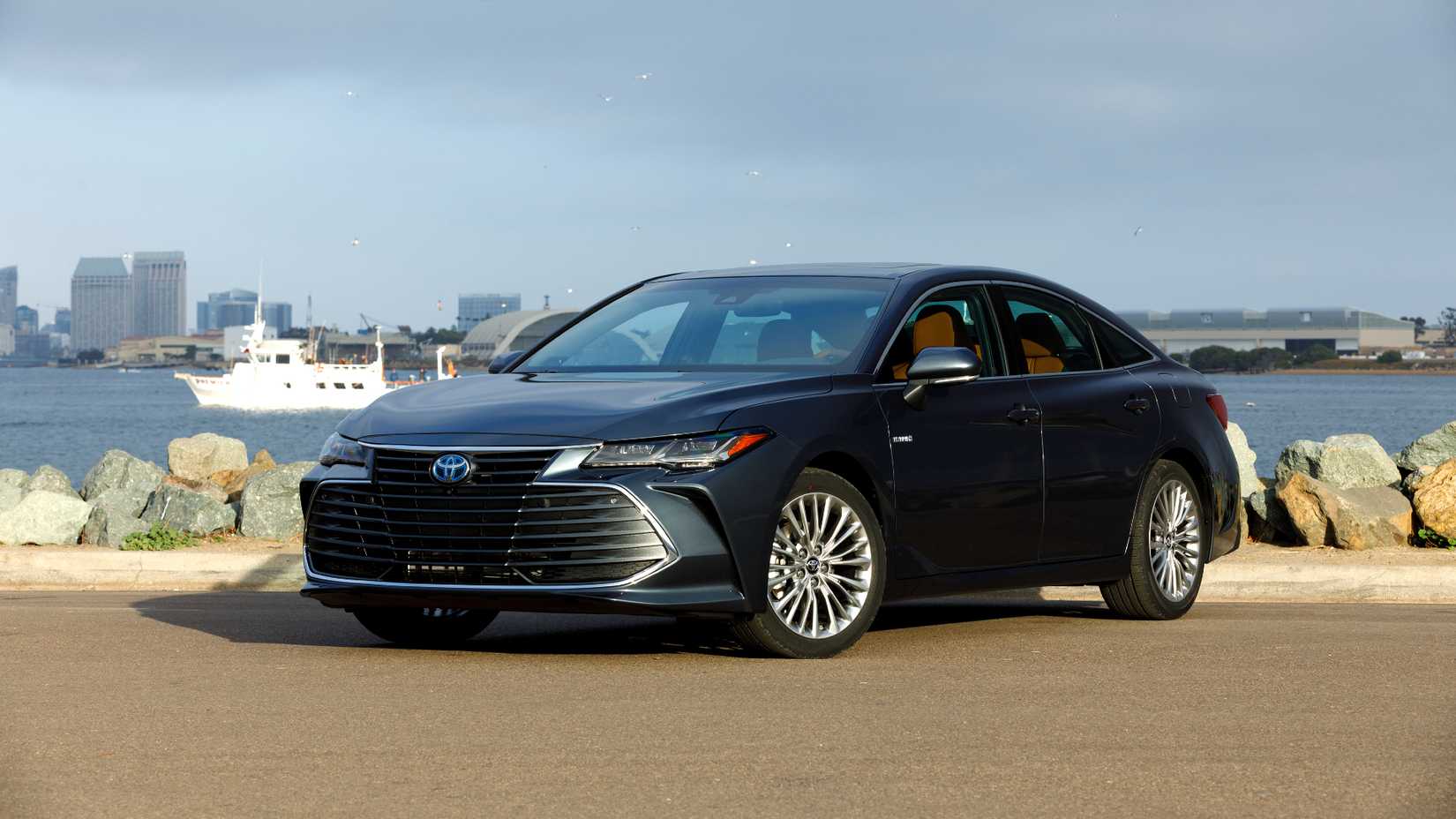 2020 Toyota Avalon Hybrid Exterior Parked In Front Of Waterway