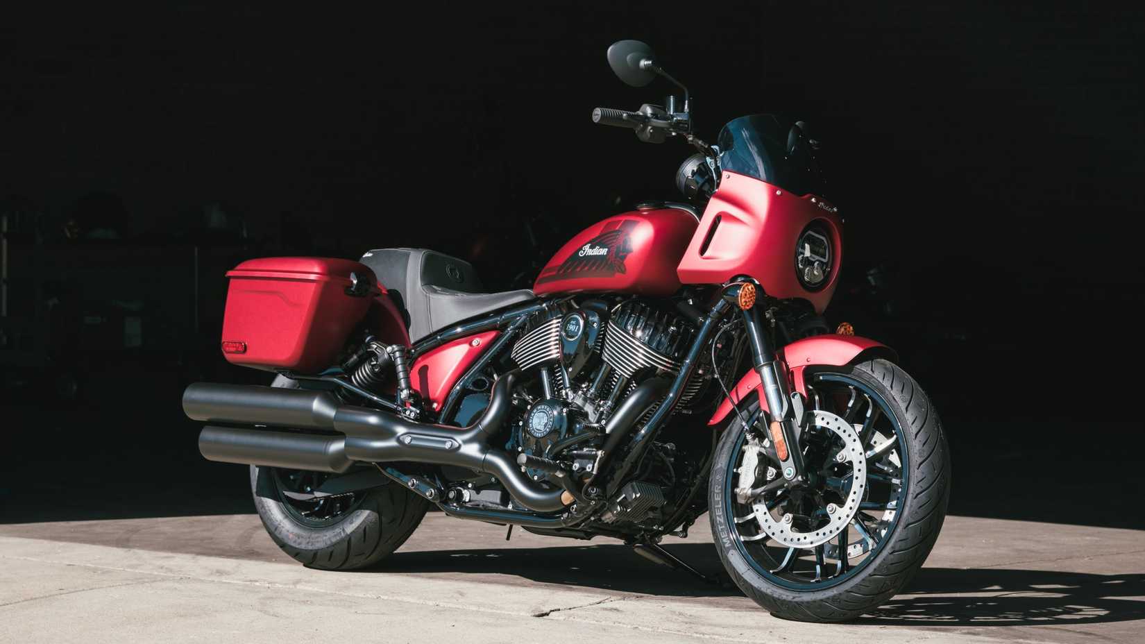 Stock 2025 Indian Sport Chief RT in red front third quarter view