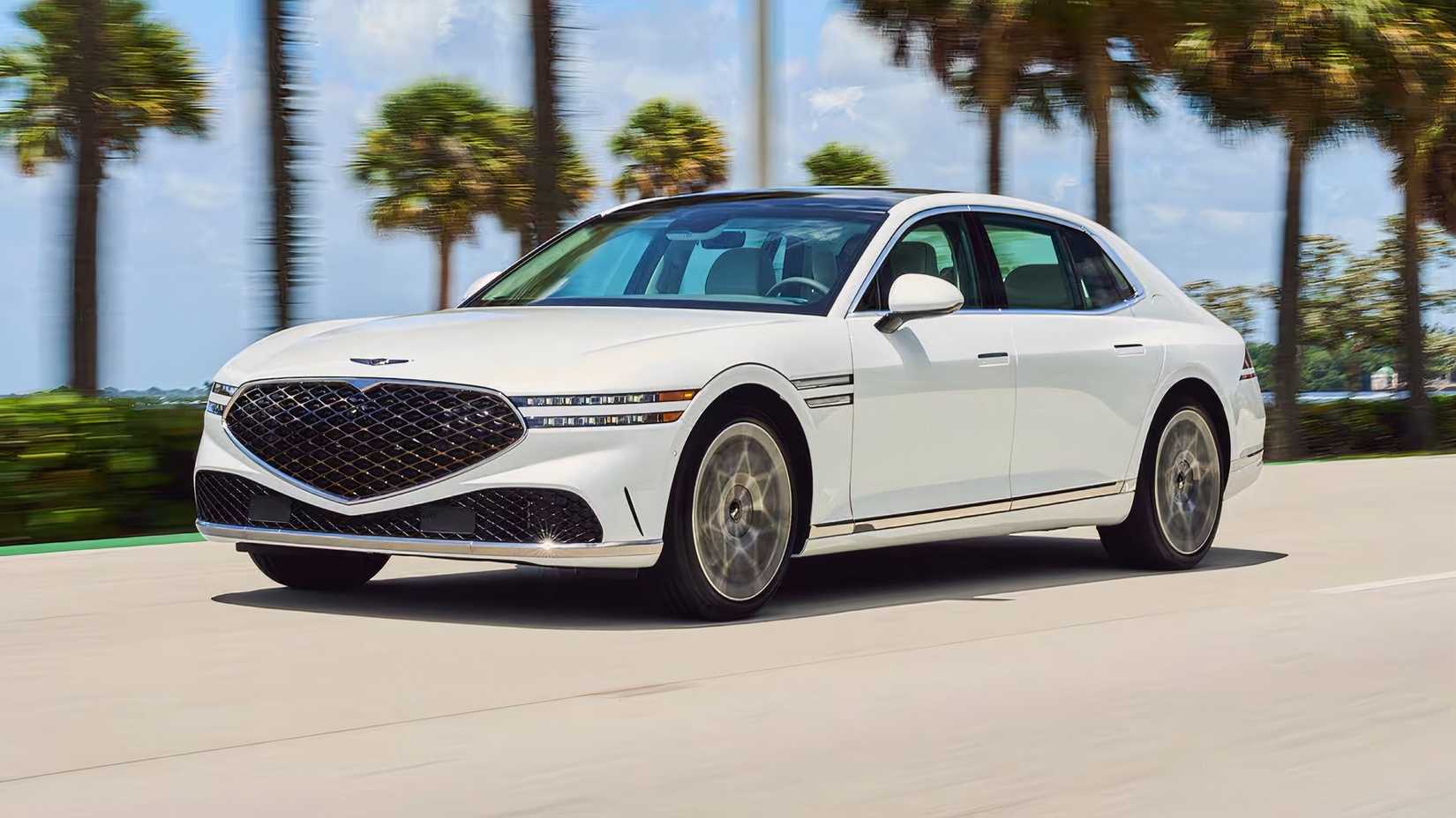 2025 Genesis G90 3.5T E-Supercharger in white drving on coast road