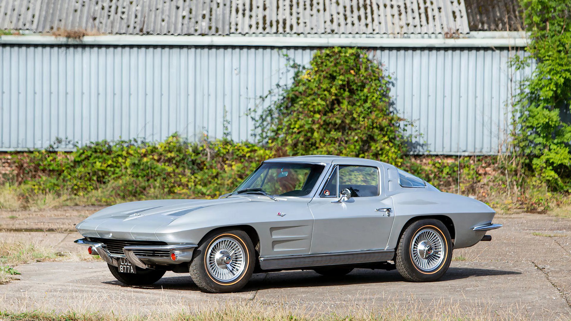 1963 Chevrolet Corvette Sting Ray 'Split Window' in silver parked