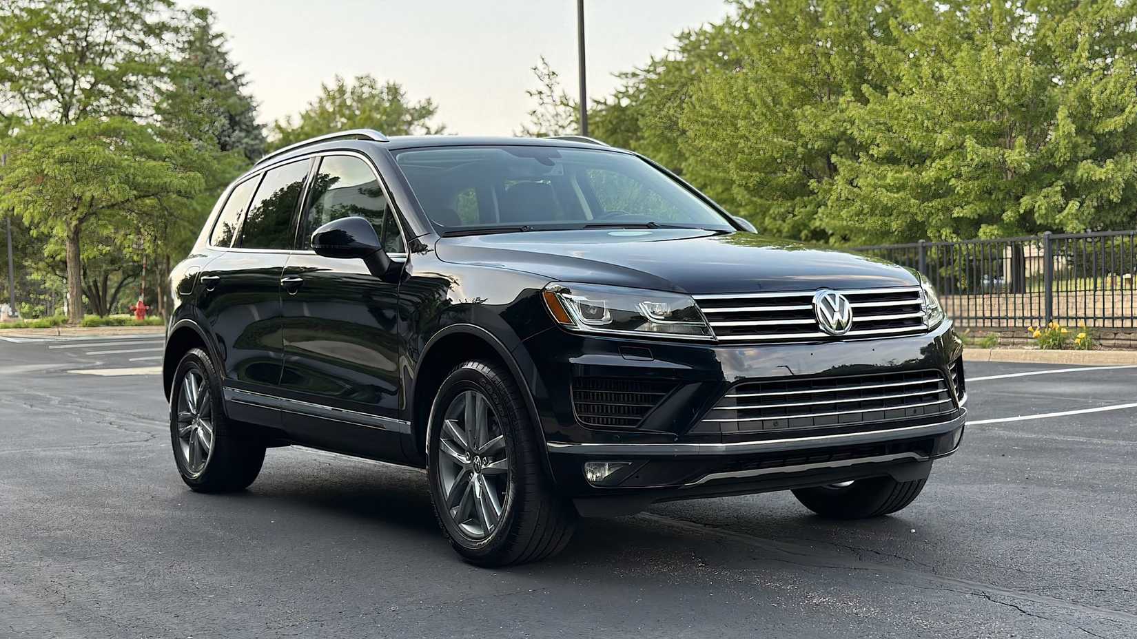 2015 Volkswagen Touareg TDI Lux in black parked in parking lot