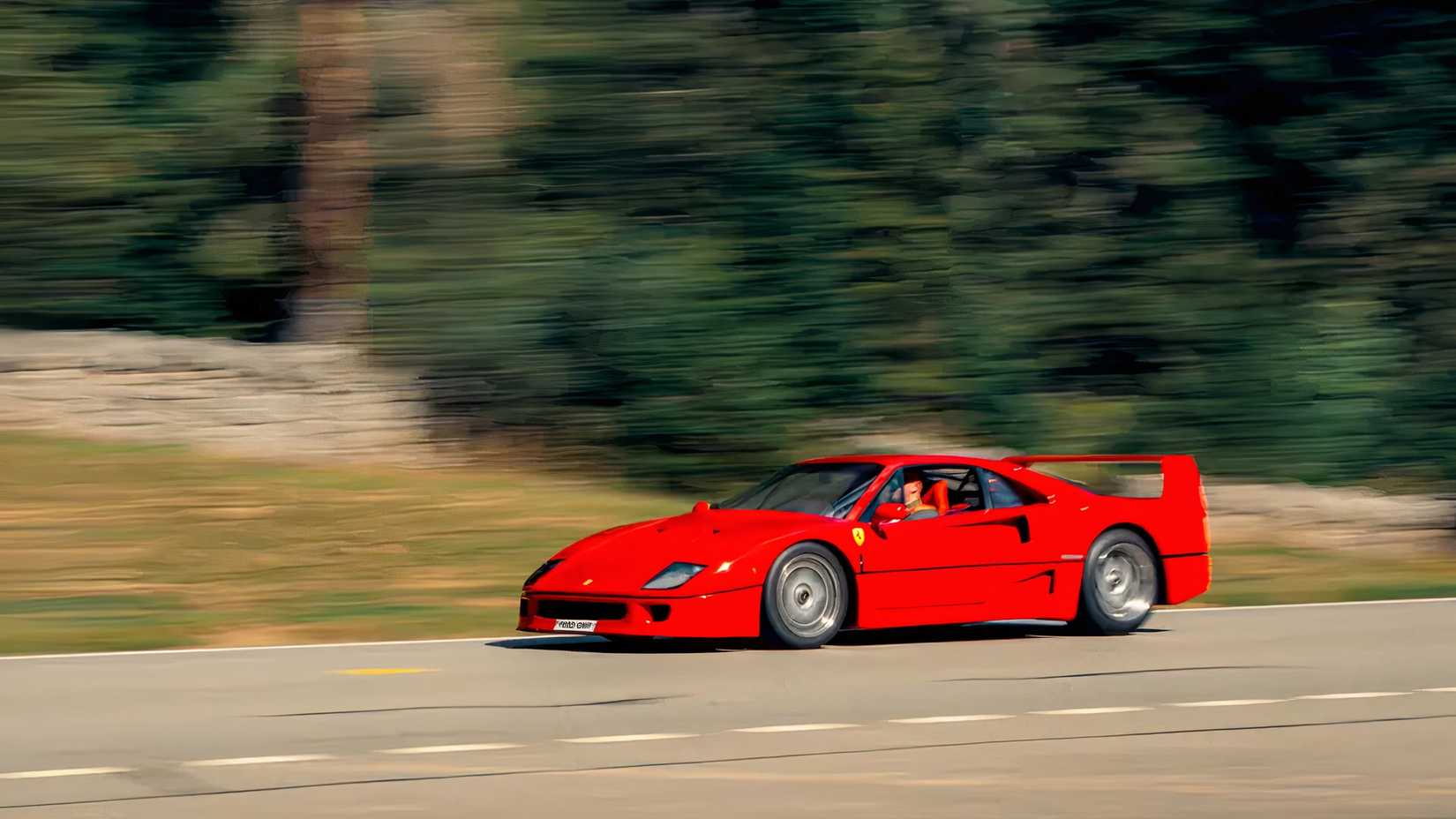 1989 Ferrari F40 in red driving on road