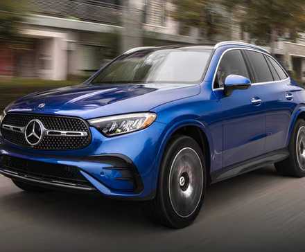 2025 Mercedes-Benz GLC-Class GLC 350e 4MATIC in blue driving on city road