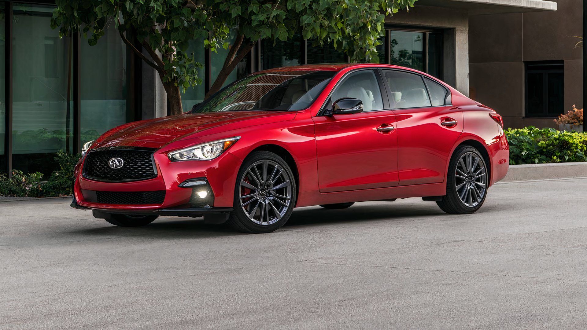 2024 Infiniti Q50 Red Sport 400 parked on street