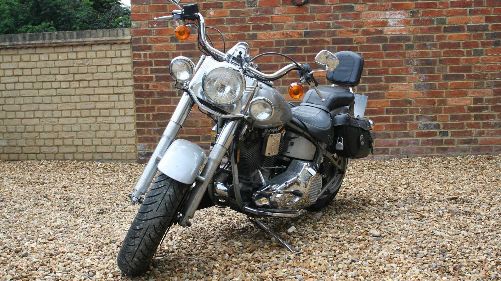 1990 Harley-Davidson Fat Boy Grey Ghost parked on its side stand