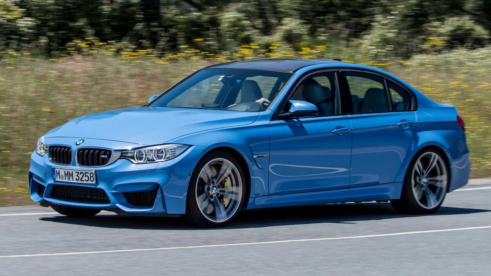 2015 BMW M3 in blue being driven