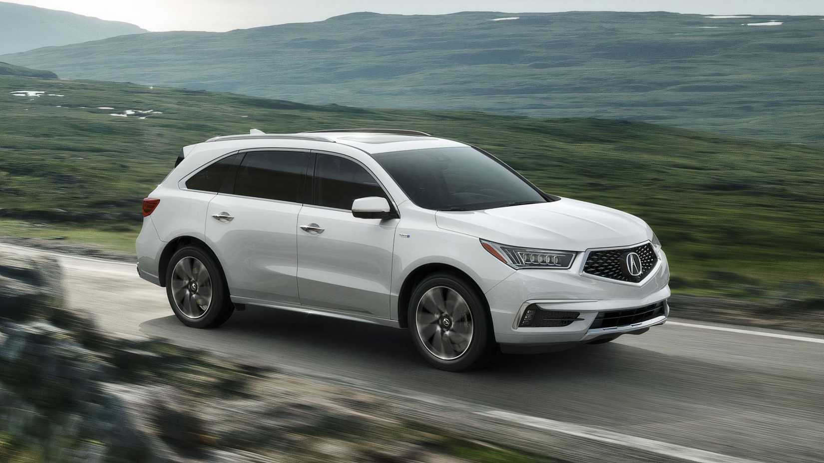 White MDX Sport Hybrid front-quarter