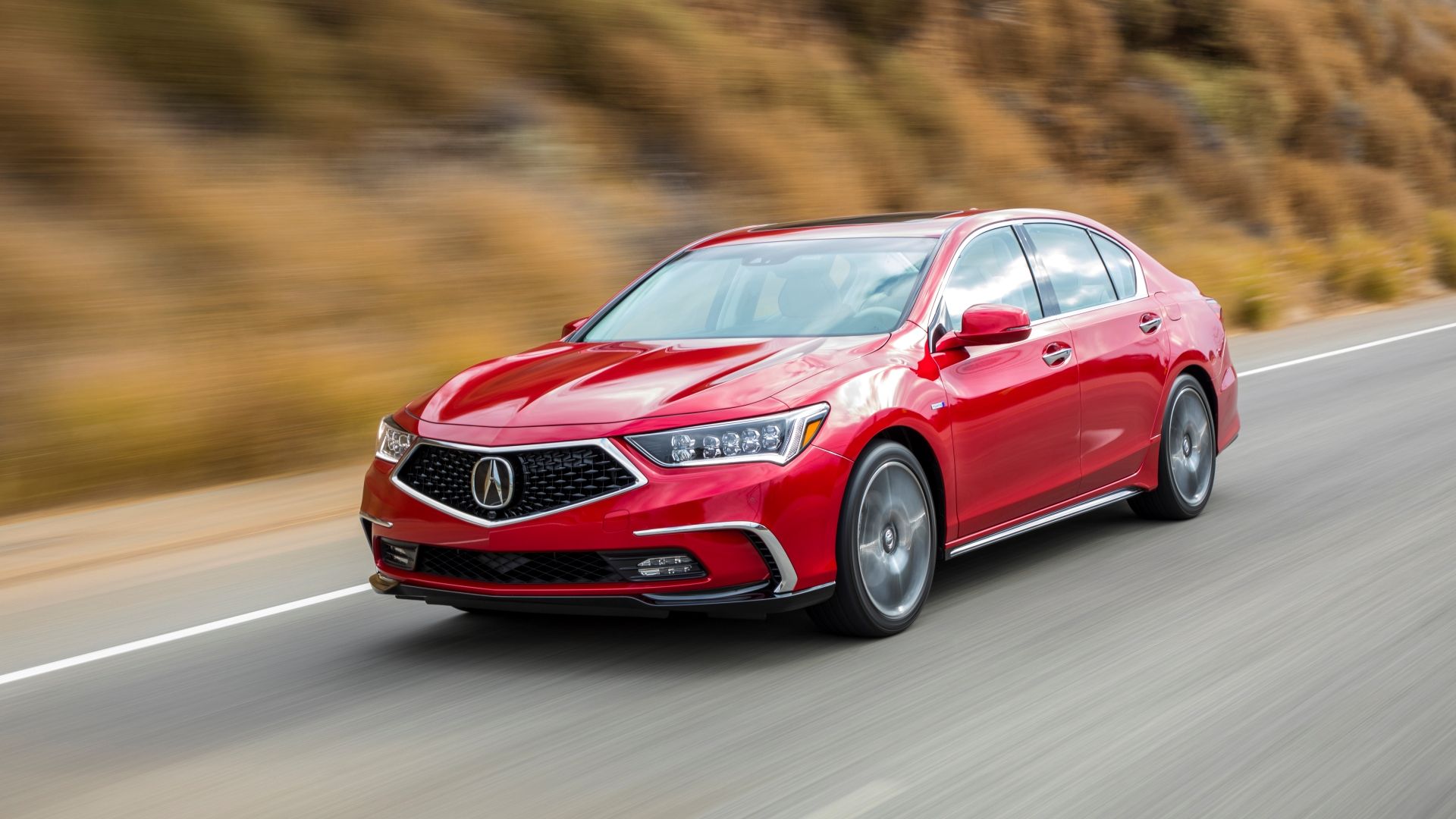 2019 Acura RLX Sport Hybrid Driving Front Three-Quarter Mountains