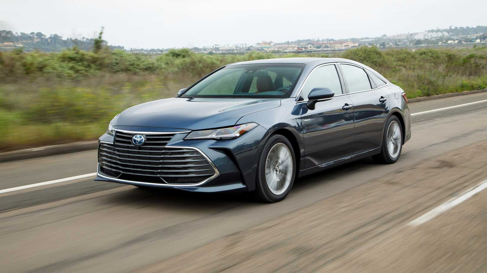 2019 Toyota Avalon Hybrid Limited Driving Front Three-Quarter