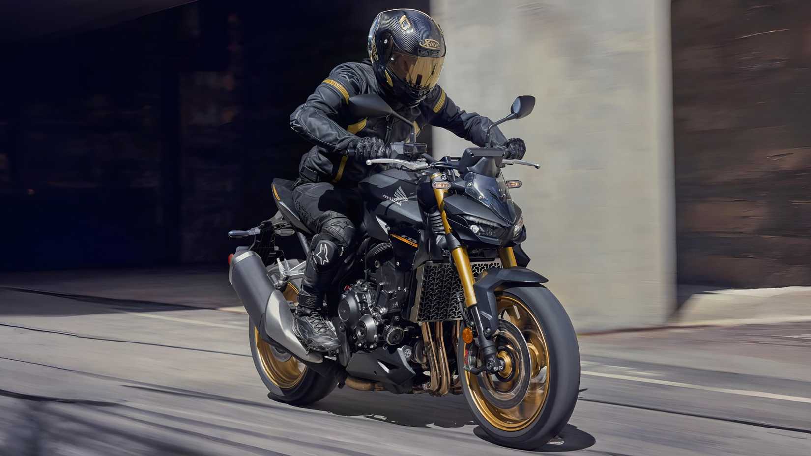 2025 Honda CB1000 Hornet SP accelerating front third quarter view