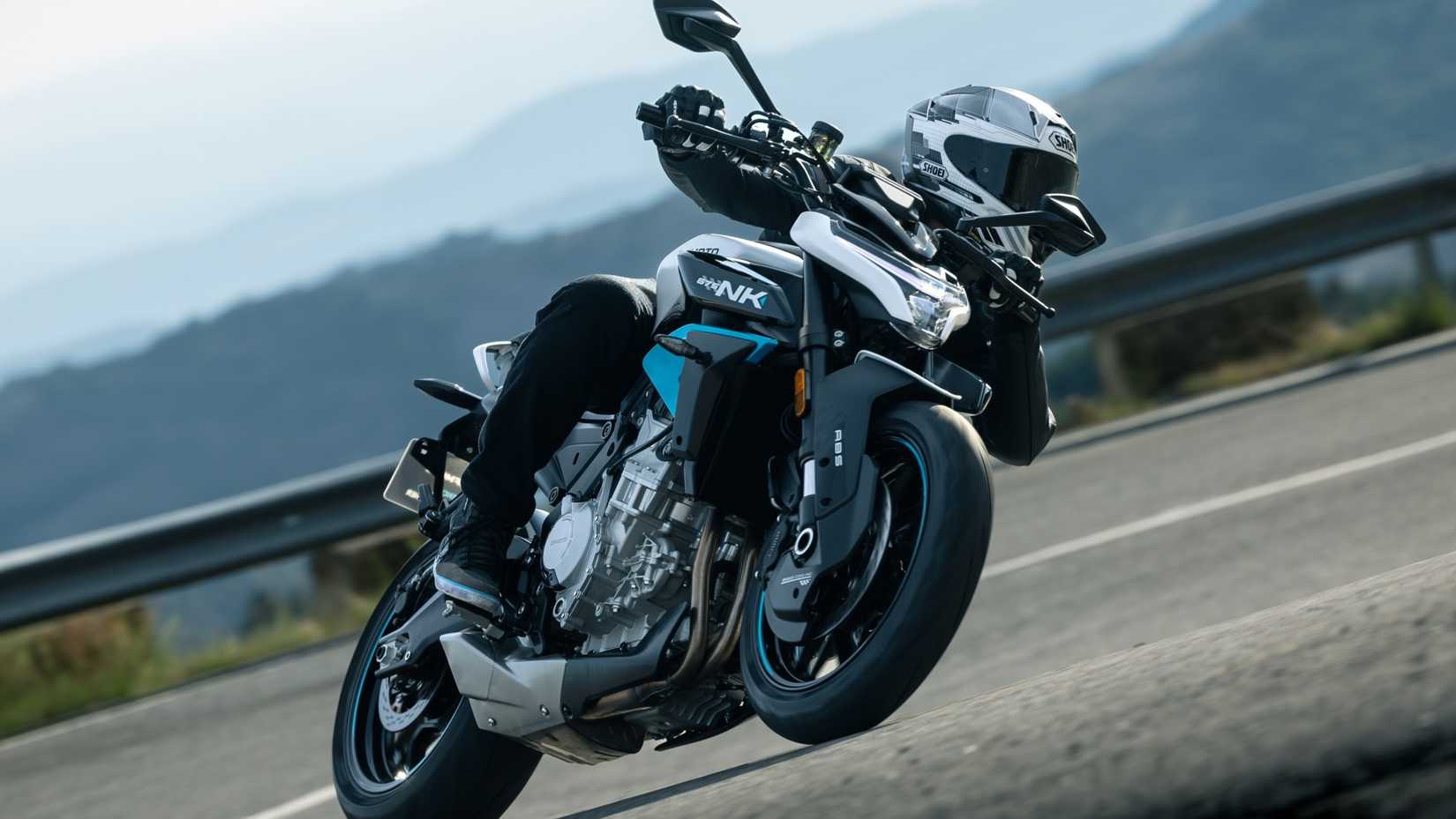 Action shot of the 2025 CFMoto 675NK cornering
