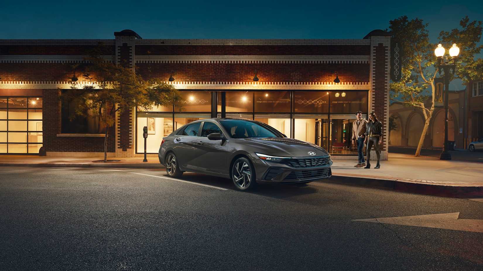 Hyundai Elantra Hybrid parked in town at night