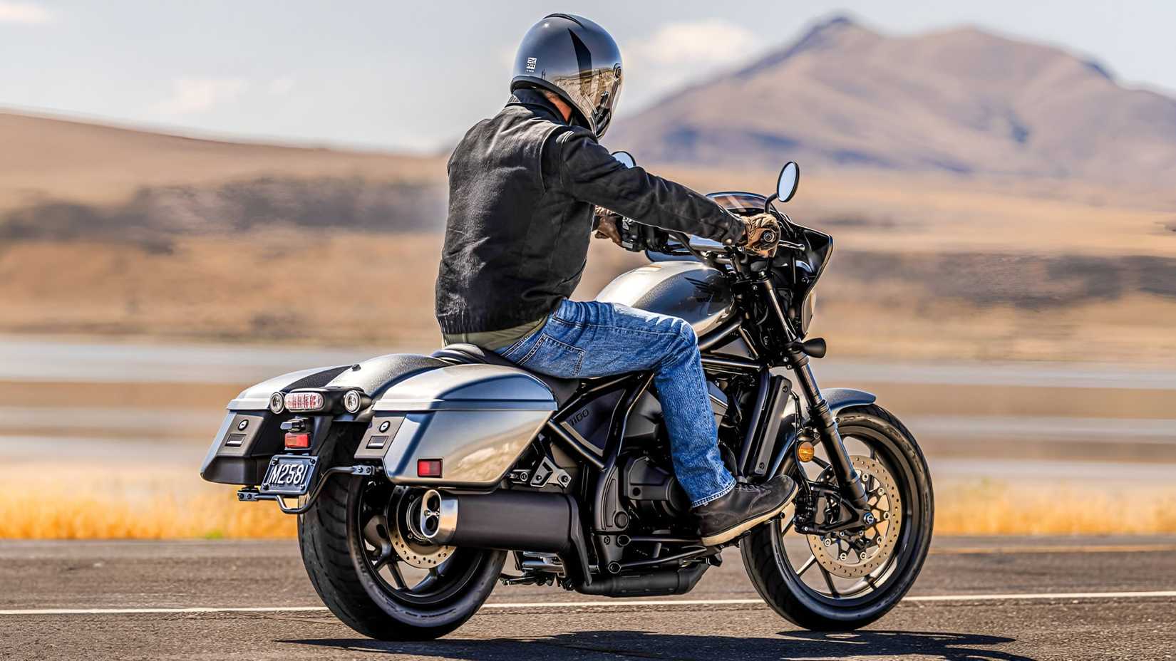 2025 Honda Rebel 1100T bagger cinematic rear third quarter view