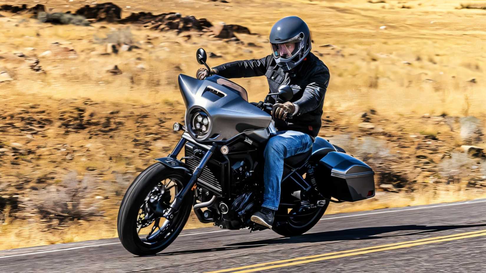 2025 Honda Rebel 1100T bagger cornering swiftly front third quarter view