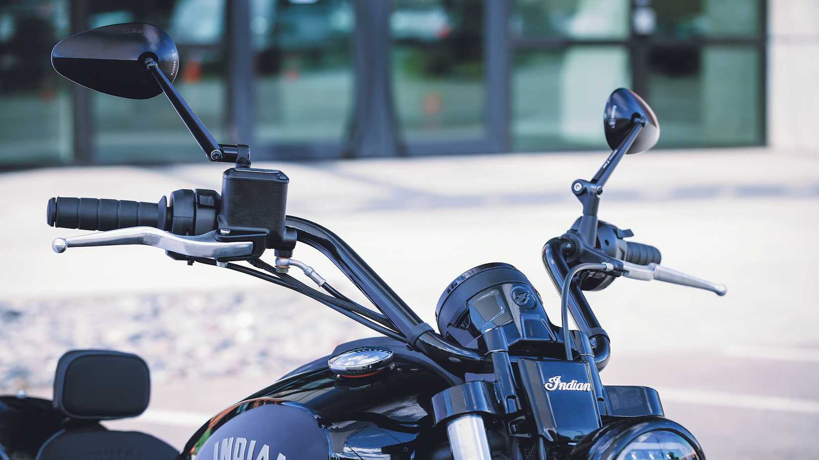 Accessorized 2025 Indian Scout Sixty Bobber handlebar close-up detail